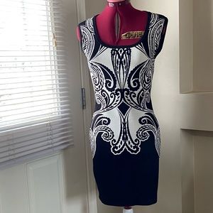 Guess women black and white sleeveless stretch knit bandage dress. Size M. Used